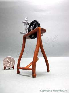 Scale doll house spinning wheel finished in walnut  