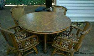 VINTAGE RATTAN GAME TABLE   SWIVEL CHAIRS  
