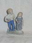 Boy & Girl Sitting on Stump With Grapes Porcelain Figurine  Made in 