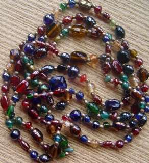 Long Vintage Multi Colored Glass Necklace Measures a total of 56 