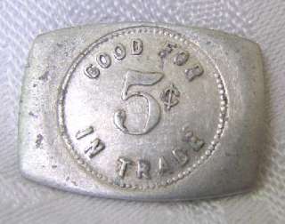 This listing is for a token from Coffman Bros good for 5 cents in 