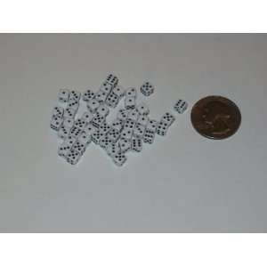    5mm Tiny Mini Dice Set of 50   White with Black Pips Toys & Games