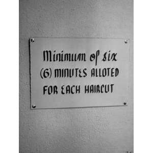  Sign on Wall Announcing Minimum of Six Minutes Alloted for 