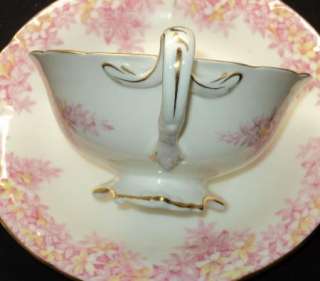 ANTIQUE CAULDON Tea cup and saucer TWIST HANDLE  