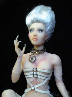 Her armature consists of strong, double twisted wire, brass tubing and 