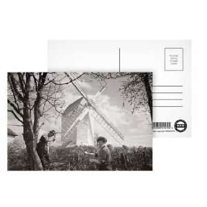 Men chopping wood near a windmill   Postcard (Pack of 8)   6x4 inch 