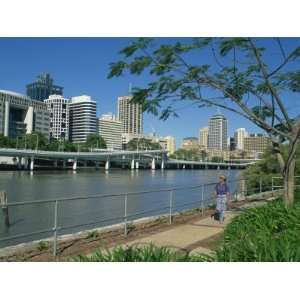  Tourist Walking Beside the Brisbane River and the City 