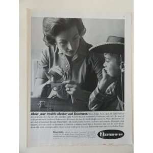 Nationwide Insurance. Vintage 60s full page print ad. (mom fixing gun 