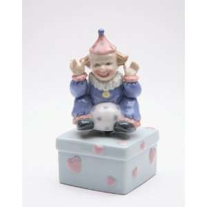 Fine Porcelain Clown Sitting with Ball Musical Figurine   ? Hes Got 
