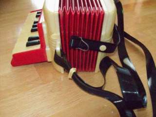 This auction is for a Magnus trainer accordian, original with box and 