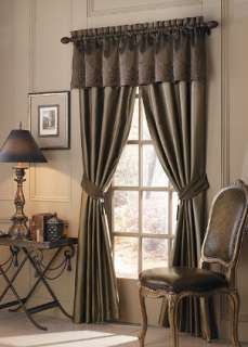 Dark green satin curtains complemented by satin valance