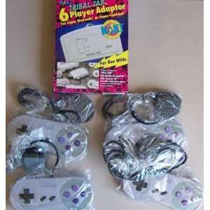 4 Super Nintendo Controllers + multitap 