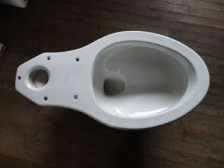   Wellworth Elongated Toilet with 14 Rough In and Left Hand Trip  