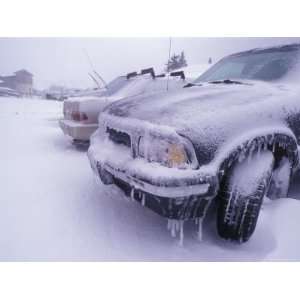 Blizzard Conditions at Ski Resort, Drifts and Ice on Cars, California 
