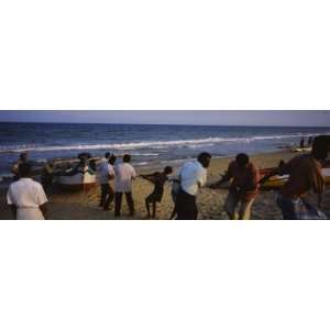  People Pulling a Boat Up to the Shore, Marina Beach, Chennai 