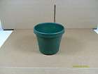 Plastic Pot with drain holes 4 inch diameter top & about 3 inches tall 