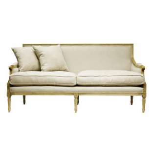  an informal touch to this elegant Louis XVI style sofa. Upholstered 